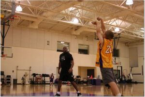 Ethan shooting over Magic